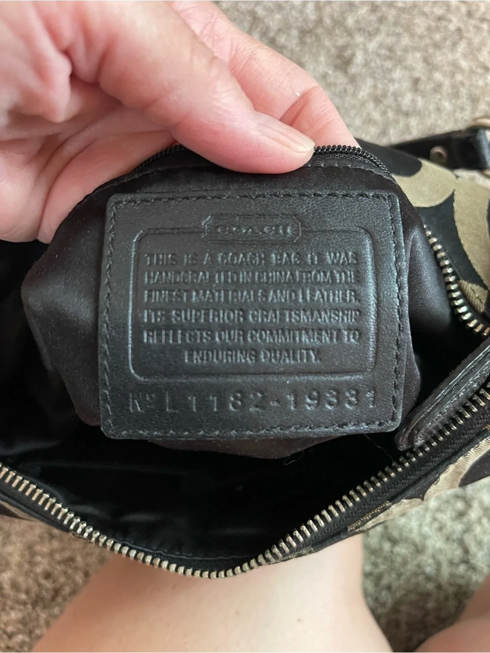 Vintage Coach Black and Tan Signature Circle-Print Hobo with silver lock clasp